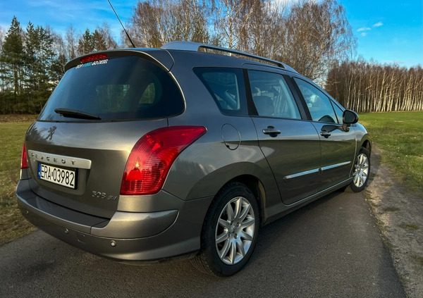 Peugeot 308 cena 15500 przebieg: 266899, rok produkcji 2009 z Rogoźno małe 211